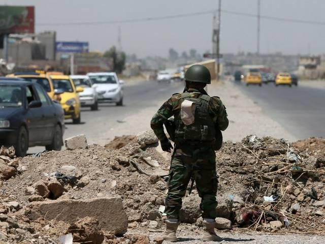 इराक को हथियार देगा ईरान, सैनिक नहीं भेजेगा: मंत्री IRAQ_IRAN_MILITARY_