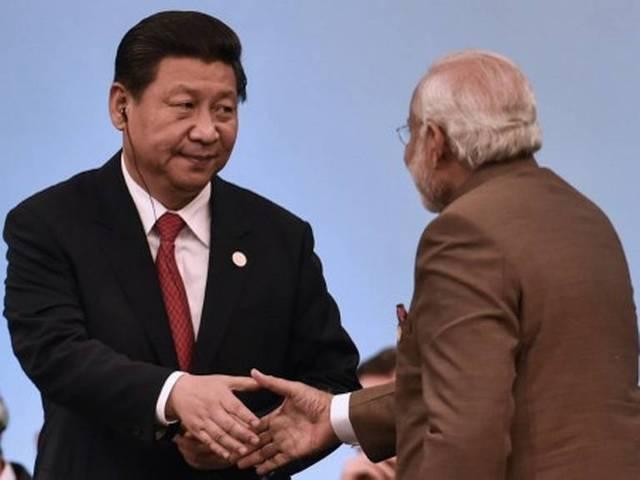 शी के विरोध में तिब्बतियों का प्रदर्शन Tibetans protest Xi’s India visit