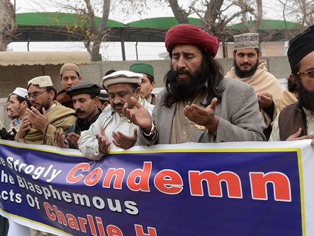 पाकिस्तान: विवादित कार्टून के खिलाफ प्रस्ताव पारित pakistan