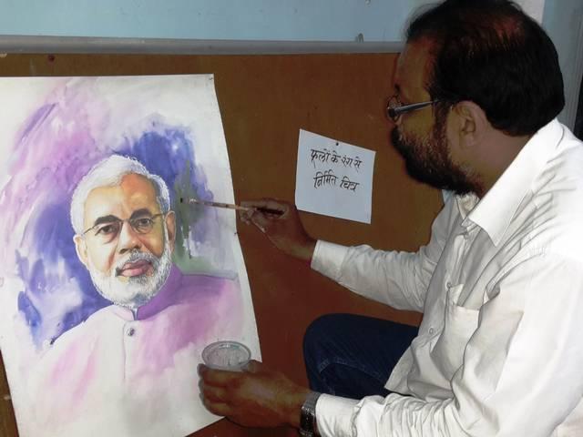 सब्जी और फूलों के रंग से बनी मोदी की तस्वीर! painting made by flower colour
