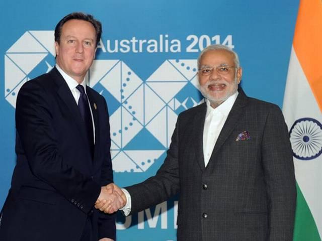 मोदी ने कैमरन को फिर से प्रधानमंत्री बनने पर बधाई दी Narendra Modi_David Cameroon_Britain_