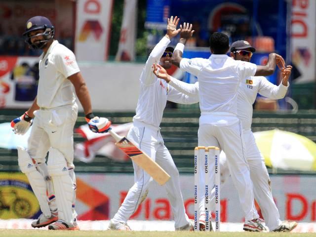 INDvsSL: पुजारा के शतक के बाद अमित मिश्रा का अर्द्धशतक SL strike twice before rain ruins play