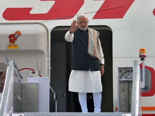 पेरिसः गरीब देशों की मदद के लिए भारत ने मिलाया ब्रिटेन और ऑस्ट्रेलिया से हाथ Modi pitches for solar energy ahead of Paris summit