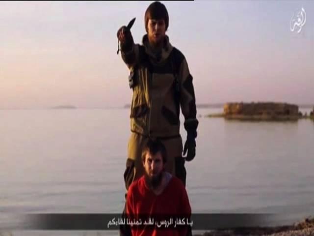 ISIS का नया वीडियो, 'रूसी जासूस' को बेरहमी से मारा ISIS warns in new video,Now putin on target