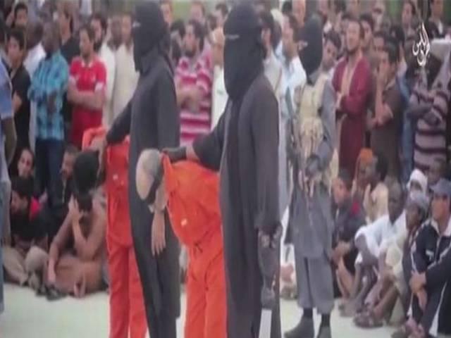 ISIS का नया वीडियो, लीबिया में भीड़ के सामने दो शख्स का सिर कलम ISIS news video of beheading in Libya