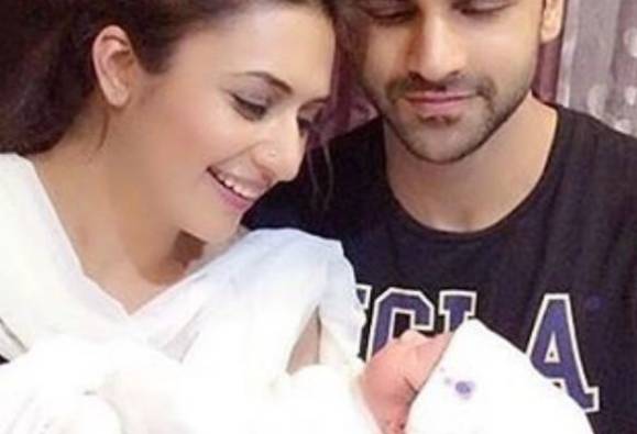 Divyanka and Vivek pose with a newborn baby!