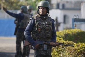 Indian soldiers guard at the Indian air force base in Pathankot, India, Tuesday, Jan.5, 2016. Indian forces have killed the last of the six militants who attacked the air force base near the Pakistan border over the weekend, the defense minister said Tuesday, though soldiers were still searching the base as a precaution. (AP Photo/Channi Anand)