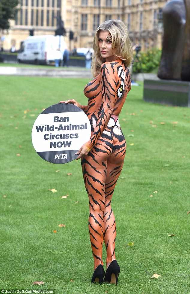 Housewives Of Miami star Joanna Krupa strips to tiger body paint to protest circuses in London