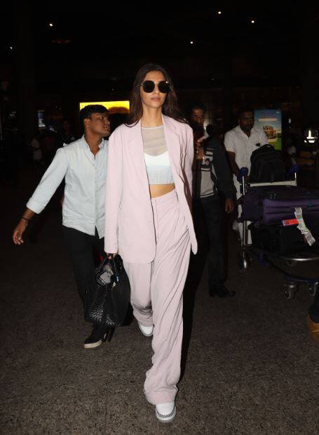 Sonam Kapoor, returning from Cannes, after the red carpet, did the airport look too impress