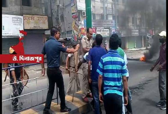 ব্যবসায়ী বনধকে ঘিরে ফের উত্তপ্ত রায়গঞ্জ, রাস্তা অবরোধ, বিক্ষোভ, পুলিশের সঙ্গে বচসা