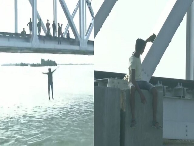 Darbhanga flood People seen clicking selfies making videos from bridge over overflowing river