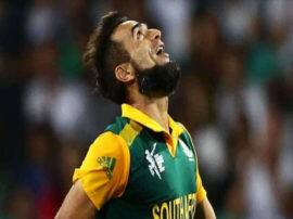 ICC World Cup 2019: पहले मैच में साउथ अफ्रीका के इस गेंदबाज ने रचा इतिहास, अपने नाम किया अनोखा रिकॉर्ड imran tahir become first spinner to bowl first over in cricket world cup history ICC World Cup 2019: पहले मैच में साउथ अफ्रीका के इस गेंदबाज ने रचा इतिहास, अपने नाम किया अनोखा रिकॉर्ड